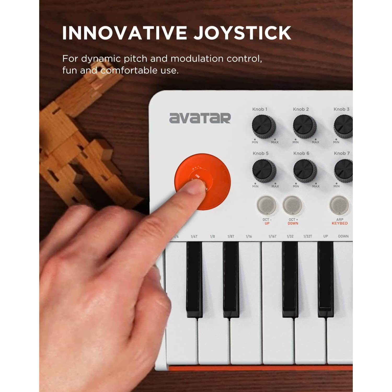 Hand pressing the innovative joystick on the Avatar EMK-25 midi keyboard for pitch and modulation control