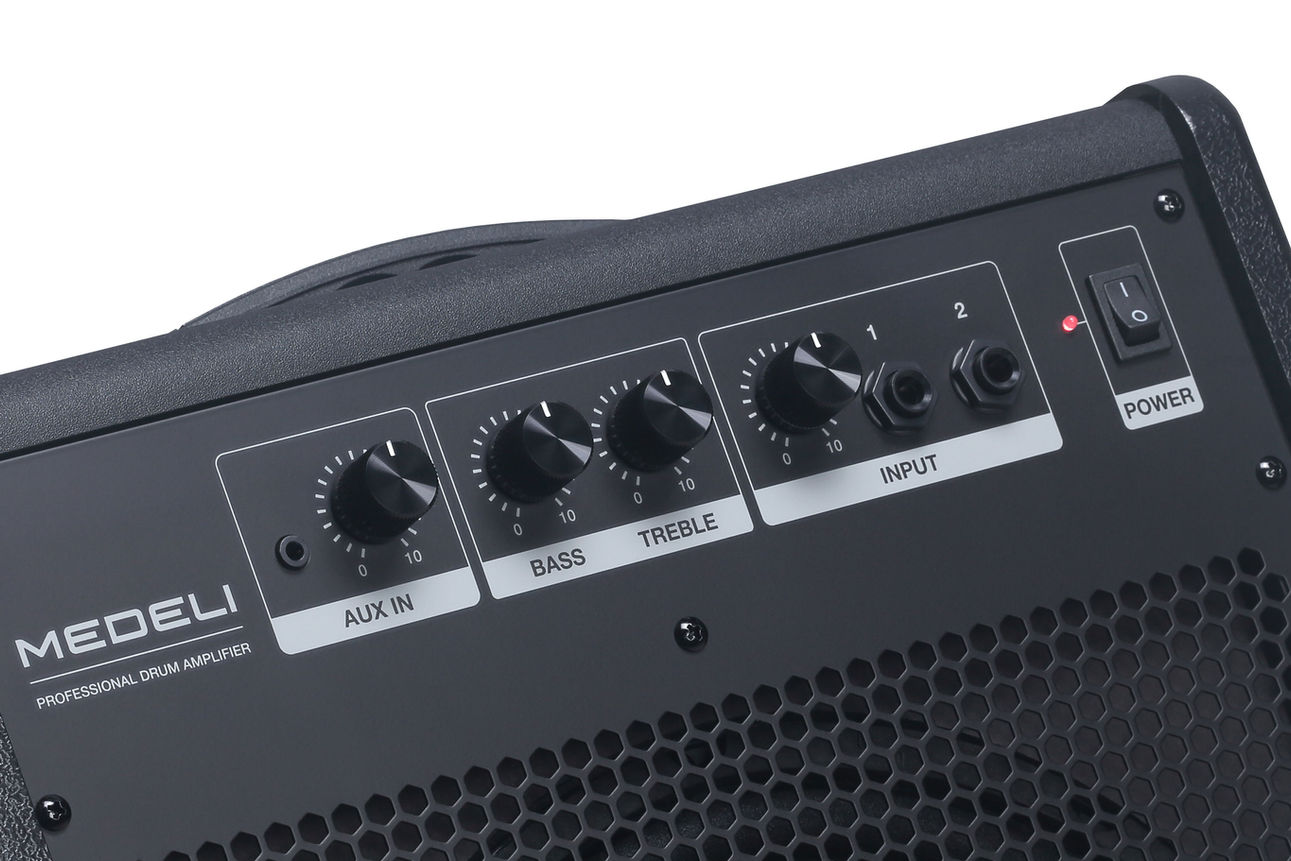 Medeli AP-33 Drum Monitor with dual volume controls, bass and treble knobs, aux input, and power switch panel.