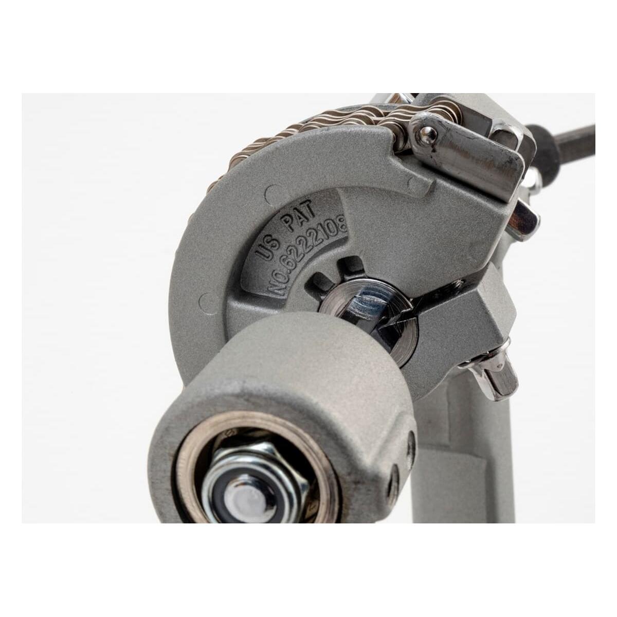 Close-up of Dixon PP-PKD K Series Double Pedal Double Chain Drive metal chain and cam mechanism for smooth motion.