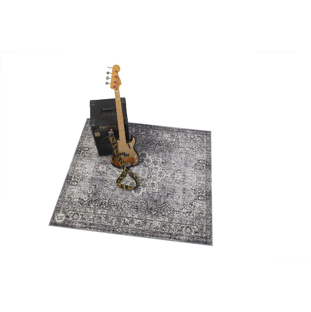 DRUMnBASE Vintage Persian Club Series Grey 165x142cm carpet under bass guitar and amp showcasing vintage Persian rug design.