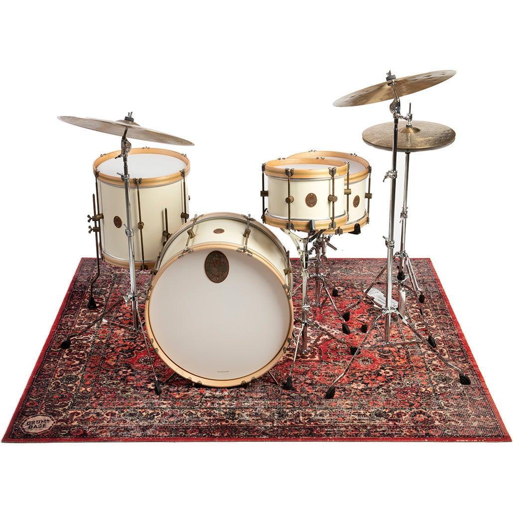 DRUMnBASE Vintage Persian Club Series Original Red 185x160cm carpet under white drum kit with cymbals and hardware