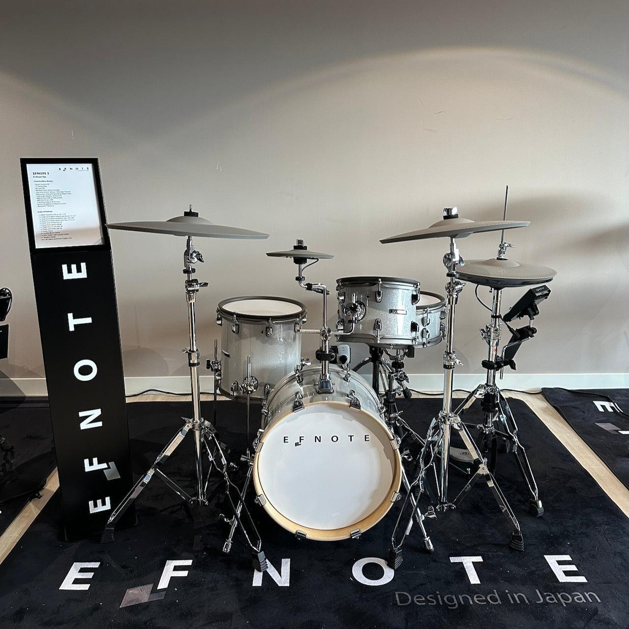 EFNOTE 5 e-drum set in pure white sparkle finish with birch wood shells and EFNOTE branding on drum heads and mat
