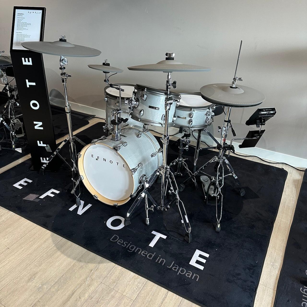 EFNOTE 5 e-drum set with white sparkle birch shells and warm-gray cymbals displayed on black EFNOTE mat