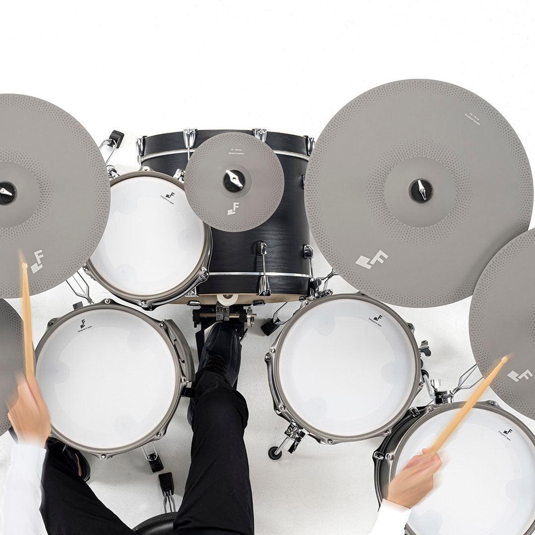 Top view of EFNOTE 5X e-drum set with player striking cymbals and drums in a studio setting
