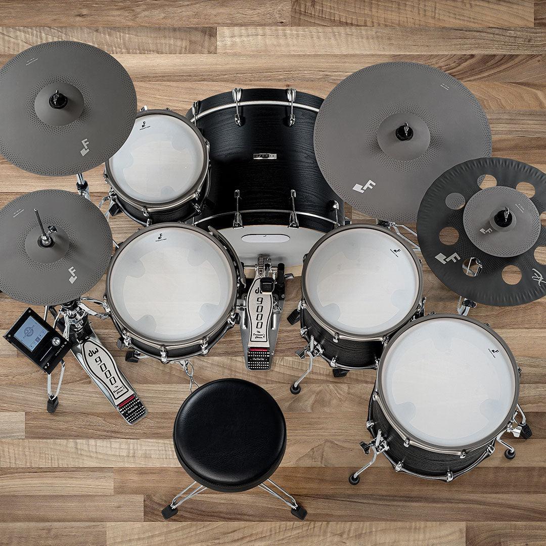 EFNOTE 7X e-drum set featuring black drums and cymbals on a wooden floor with EFNOTE branding visible
