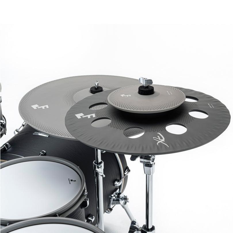 Close-up of EFNOTE 7X e-drum set cymbals and drums showcasing EFNOTE branded black and gray electronic drum components.