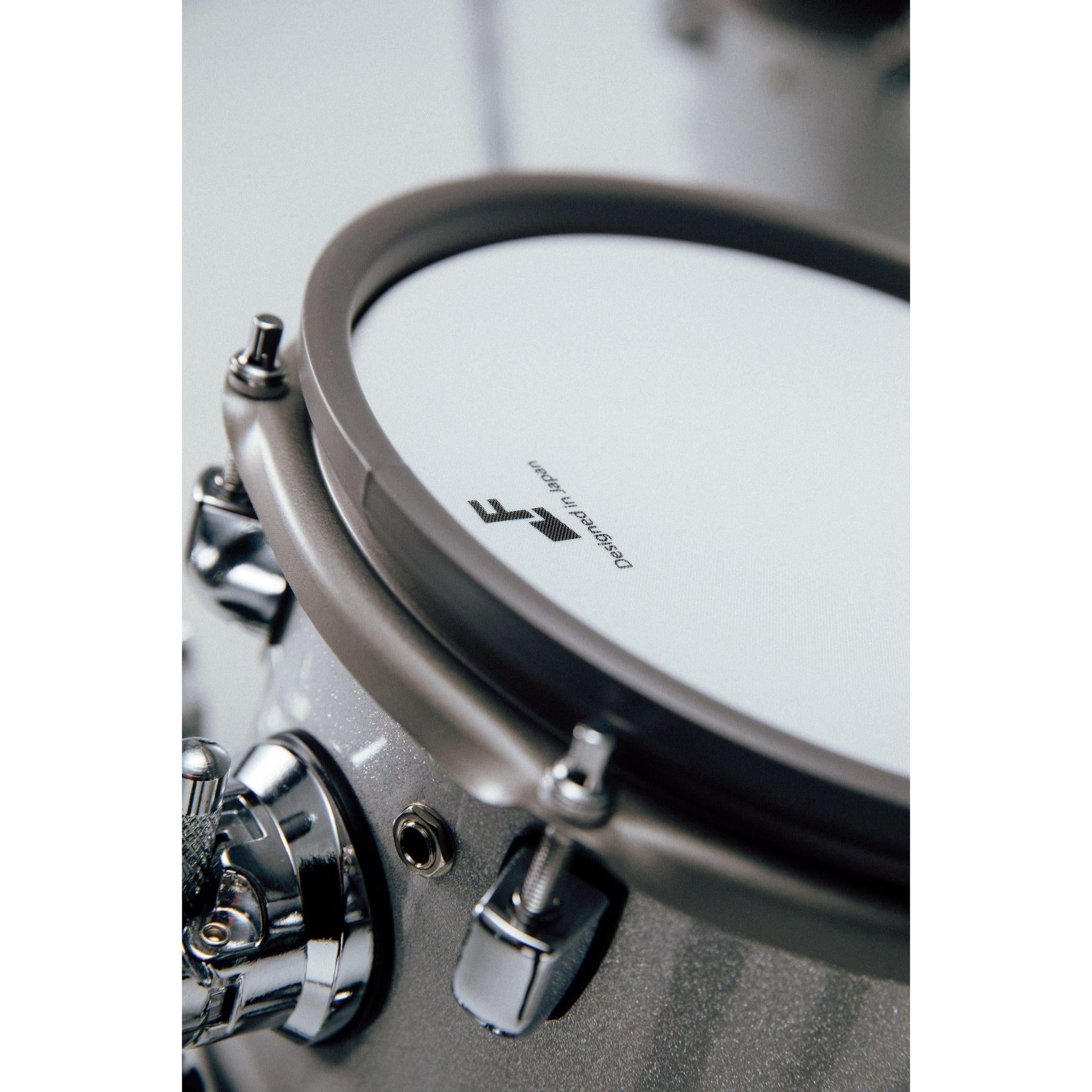 Close-up of EFNOTE mini electronic drumset drumhead with detailed silver hardware and tuning mechanism by EFNOTE.