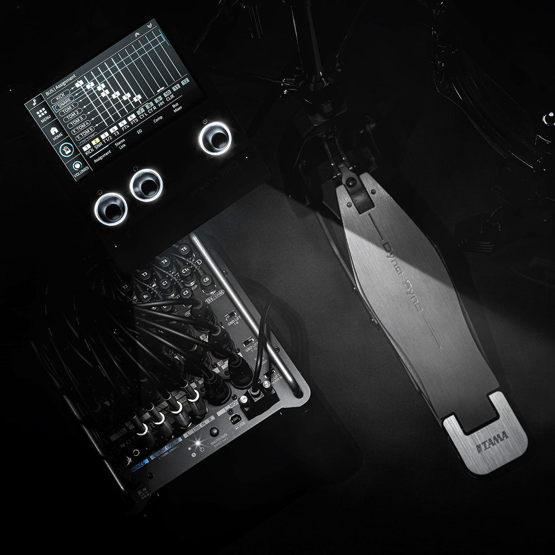 EFNOTE PRO 703X electronic drum kit close-up of control panel with illuminated knobs and drum pedal by EFNOTE