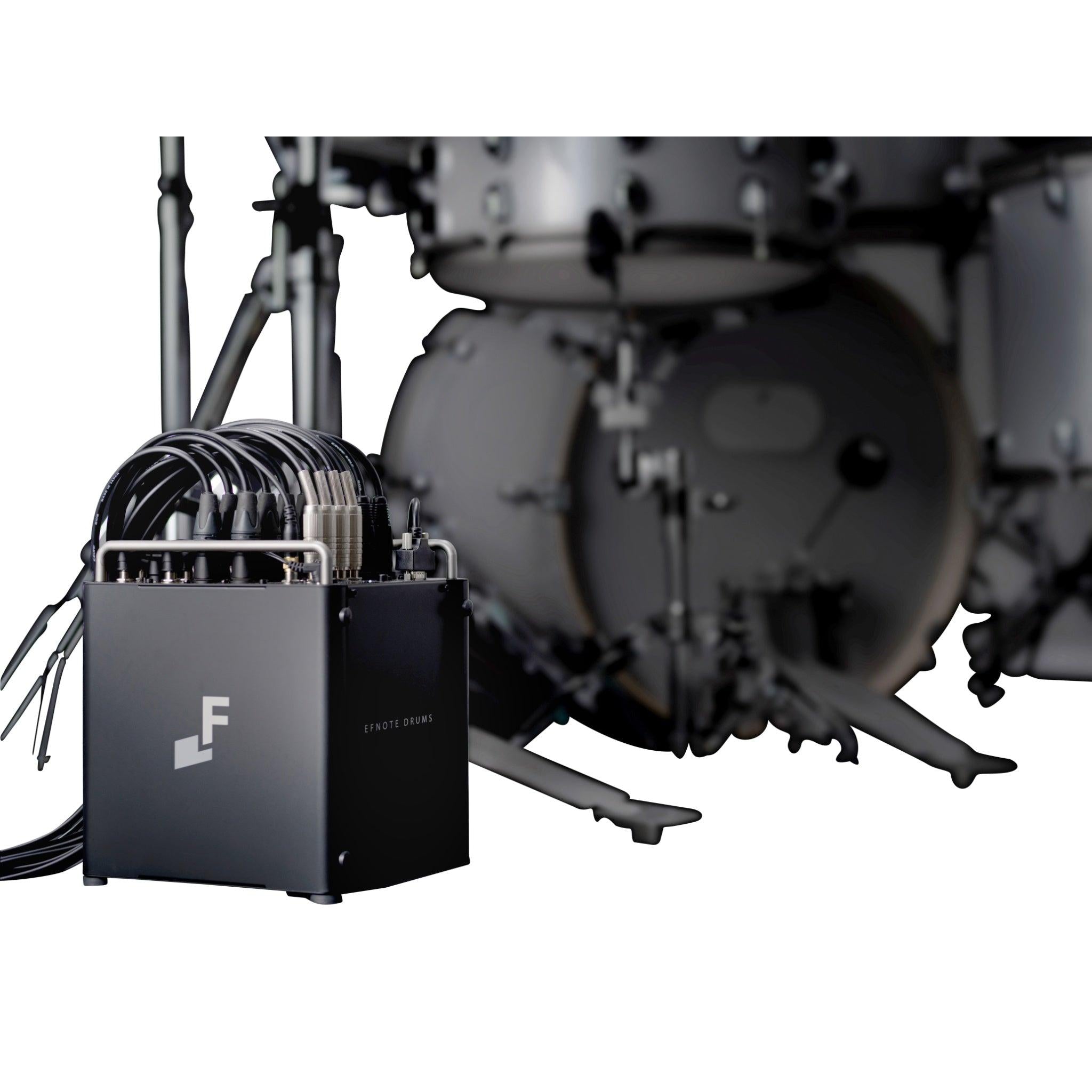 EFNote PRO 700 Standard Set electronic drum module with cables and professional drum kit in background by EFNOTE