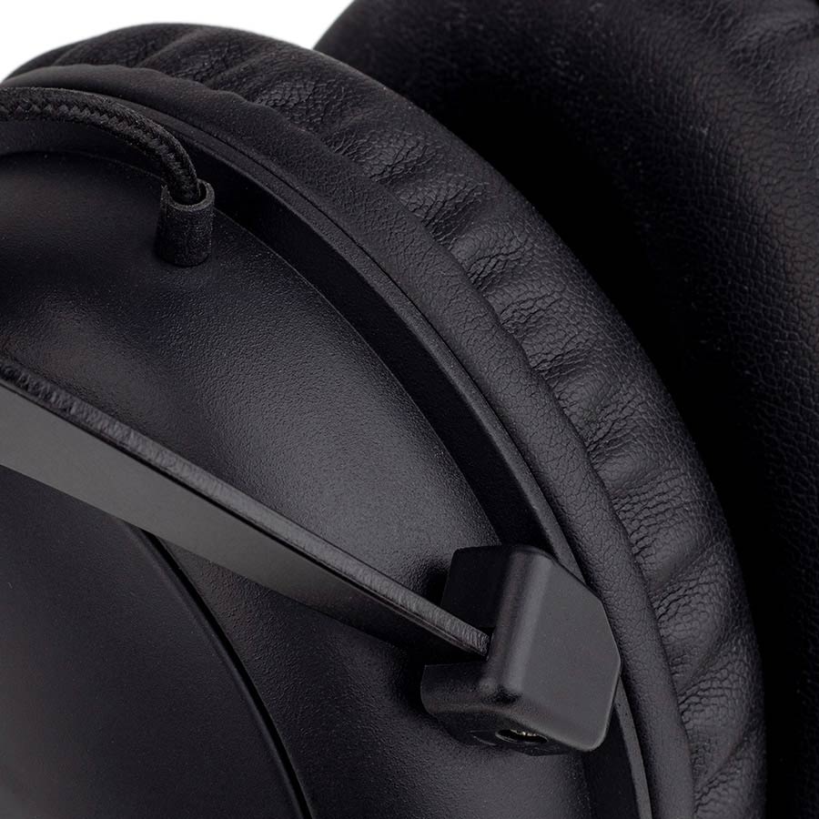 Close-up of black ear cup and padded headband on Gatt HP-100 Closed Back Professional Monitoring Headphones by Gatt