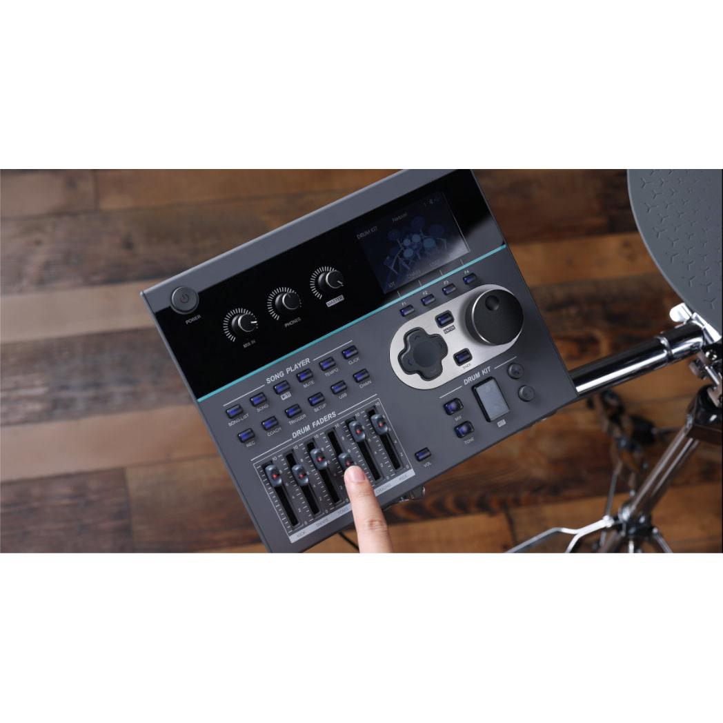 Close-up of Hampback ACE-970 e-drum set control module highlighting sound and drum feature adjustments with hand interaction