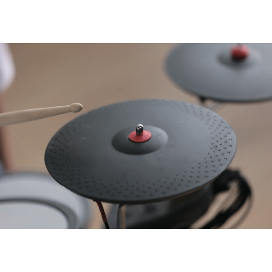 Hampback MK-0 electronic drum set for beginners and children with compact cymbal pad and wooden drumstick close-up.