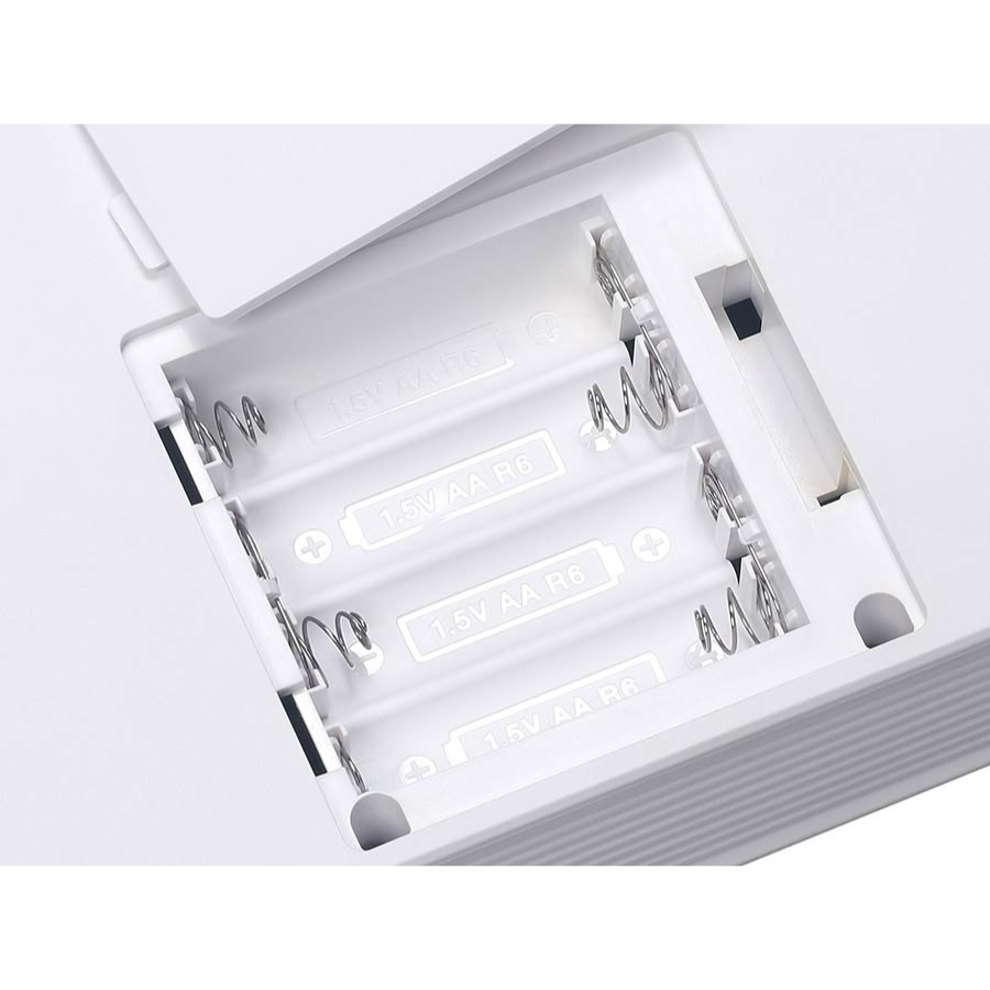 Battery compartment for Medeli MR101S - Portable Rhythm Machine showing space for four AA batteries inside the white plastic casing.