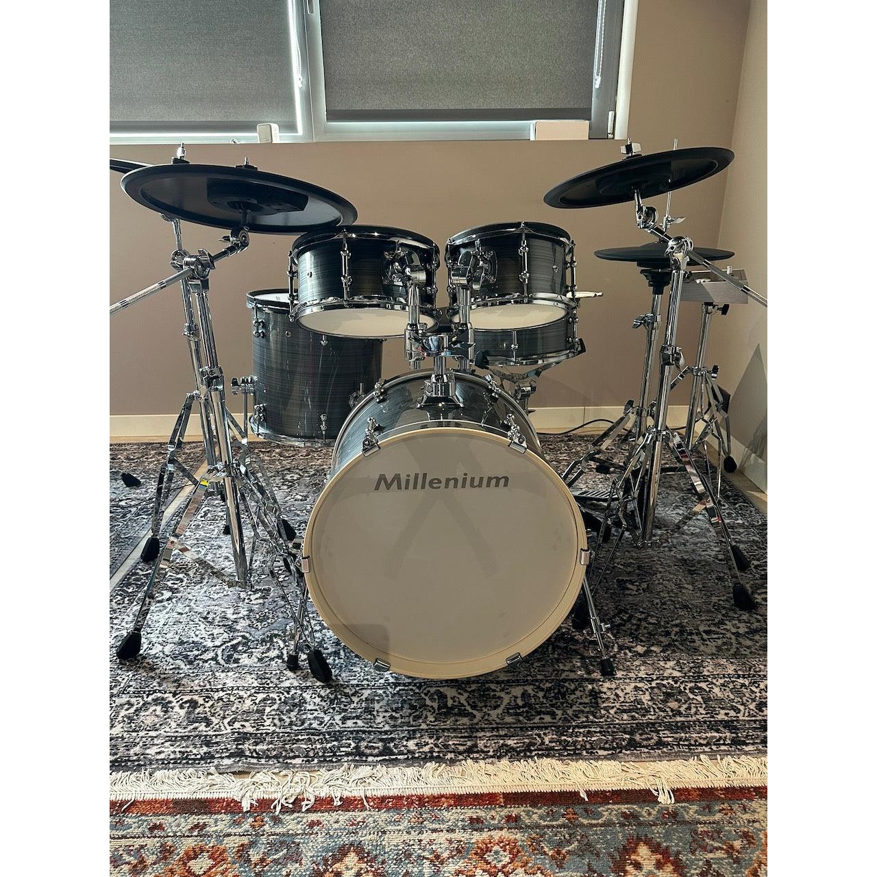 Millenium MPS-1000 E-Drum set (Pre-Owned) with real wooden shells and full warranty displayed in a room setting.