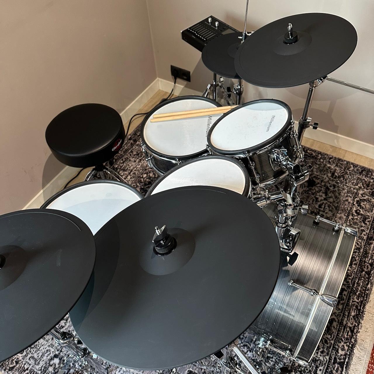 Millenium MPS-1000 E-Drum set (Pre-Owned) with real wooden shells and full warranty in a home setup on a rug