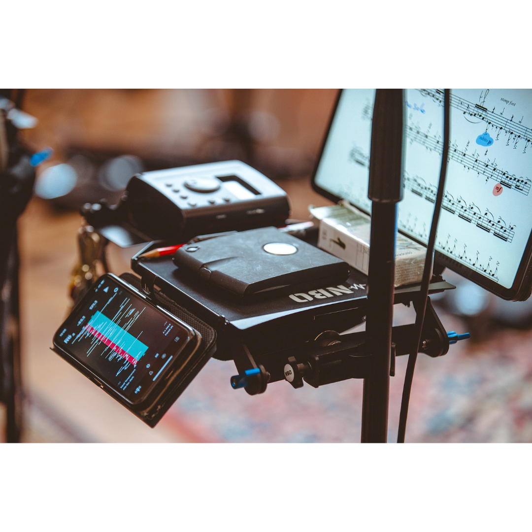 NBO Angled Extension for Oneboard supporting multiple devices, offering ergonomic angled surface and cable management by NBO.