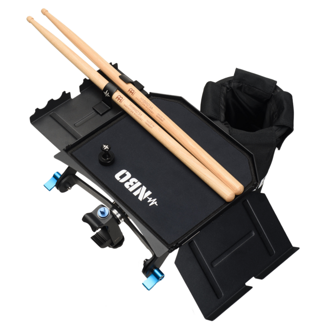 NBO Magnet Pack for Oneboard showing wooden drumsticks held by L-shaped and button magnets with black tray and bag accessories