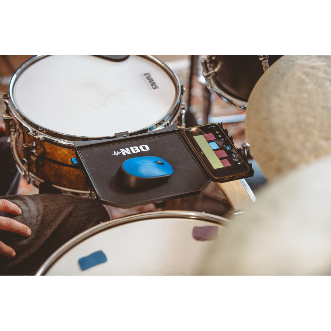 NBO Standard Extension for Oneboard attached to drum kit holding a mouse and a smartphone with sticky notes.