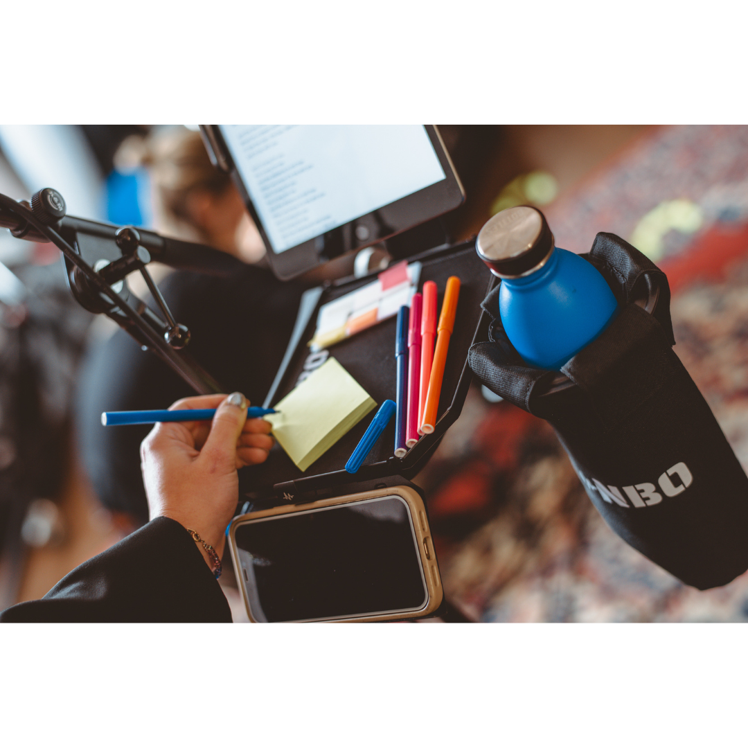 NBO Oneboard - Performance Pack with modular tray holding pens, notes, phone, and NBO branded drink holder