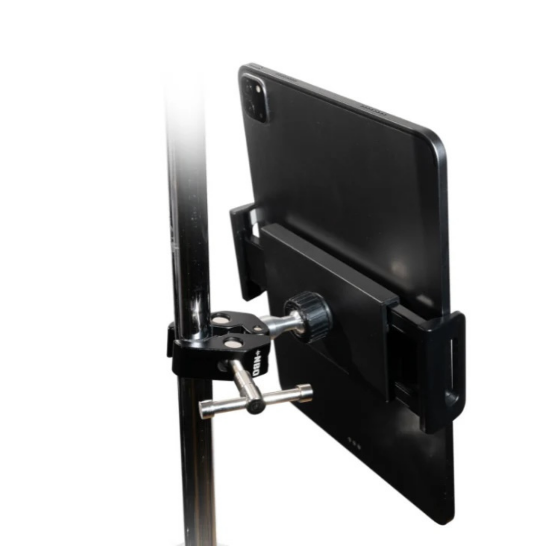 NBO Universal Tablet/Phone Holder mounted on stand holding a black tablet securely for musicians and creators.