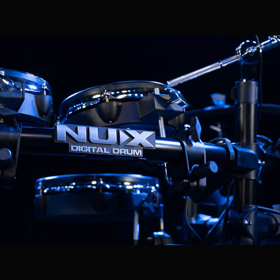 Close-up of NUX DM-7X All Mesh Head (REMO) Professional Digital Drum Kit with illuminated drum pads and hardware.