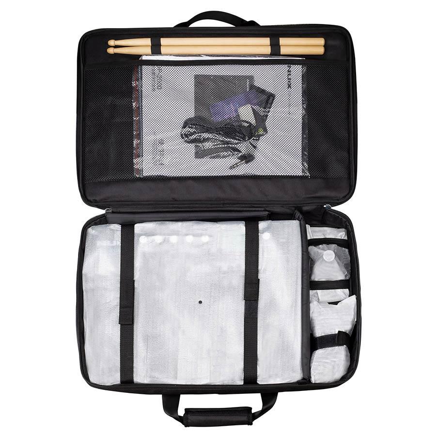 NUX DP-2000 Digital Percussion Pad packed in a black carrying case with drumsticks and accessories inside