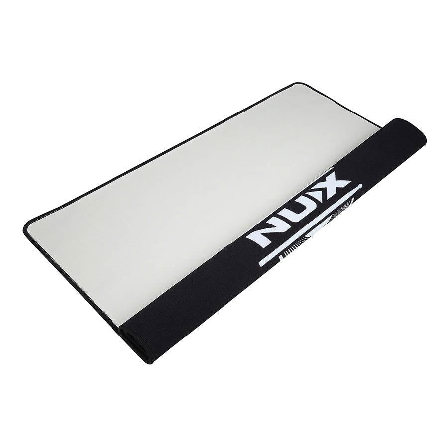 NUX Non-Slip Drum Rug partially rolled with black edge and NUX logo, high quality non-slip surface by NUX